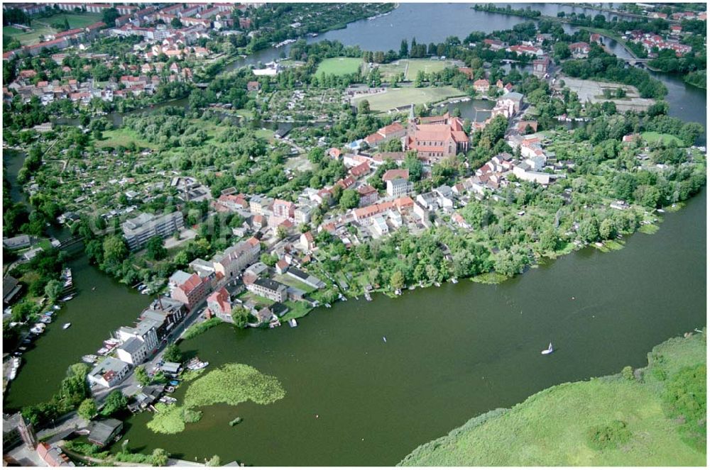 Aerial photograph Brandenburg - 22.08.2004 Blick auf den Dom zu Brandenburg. Der Dom, den Aposteln Petrus und Paulus geweiht, ist das älteste erhaltene Bauwerk und Ausgangspunkt der Geschichte der Stadt Brandenburg. Die Grundsteinlegung erfolgte 1165 durch den Mönchsorden der Prämonstratenser. Adresse: 14776 Brandenburg an der Havel, Burghof Tel.:(0 33 81) 22 44 15