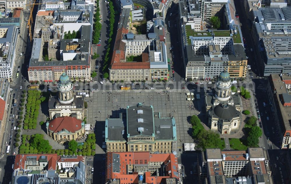 Berlin Mitte from the bird's eye view: The Gendarmenmarkt is a square of the historic center of Berlin. The centerpiece is the concert hall, which is flanked on the north side of the French Cathedral and on the opposite side of the German Cathedral. The place was built from 1688 to plans by Johann Arnold Nering as a part of the Frederick City of Elector Frederick III