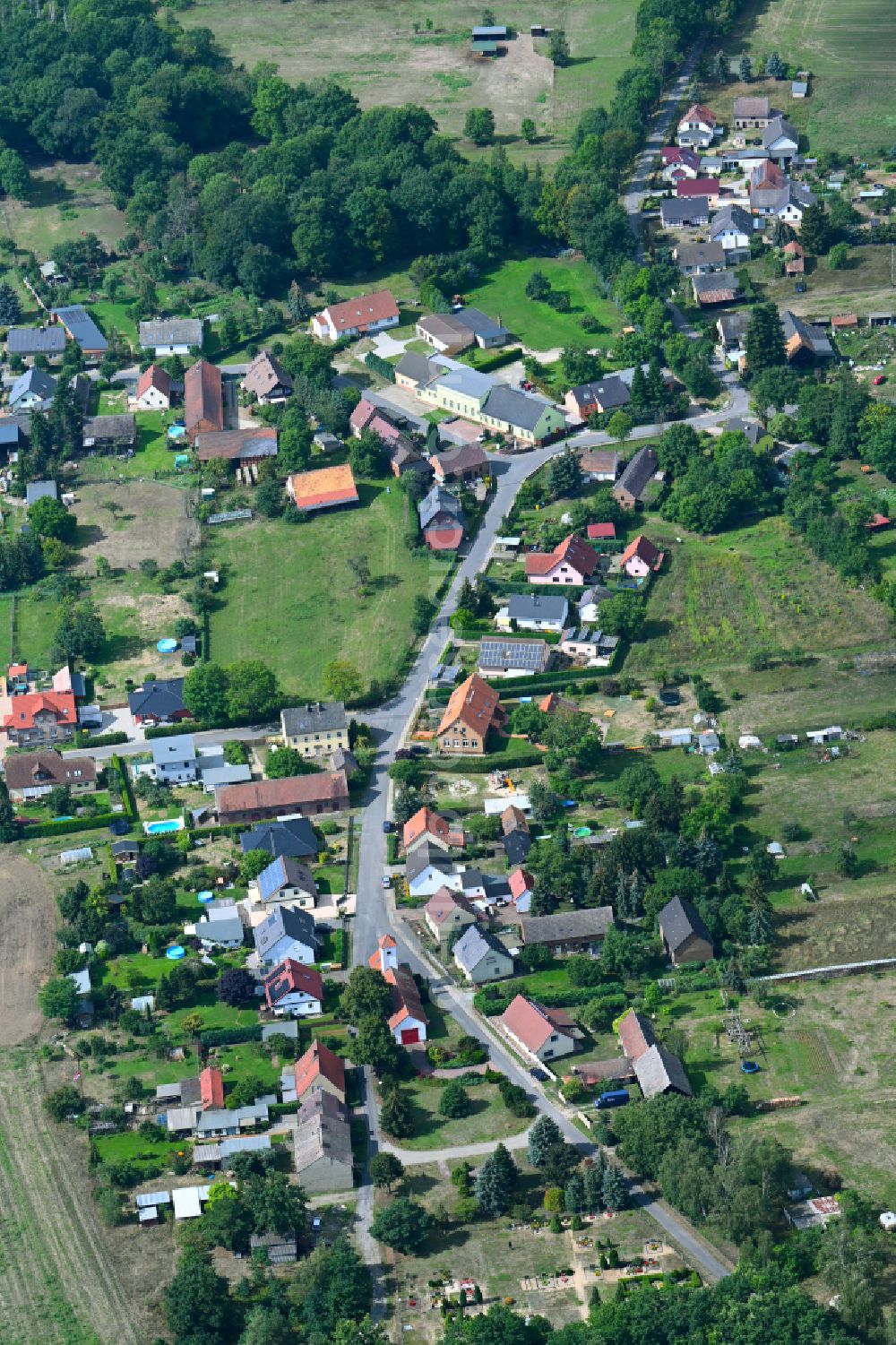 Koßwig from the bird's eye view: Village - View in Kosswig along the Kosswiger Dorfstrasse in the state Brandenburg, Germany