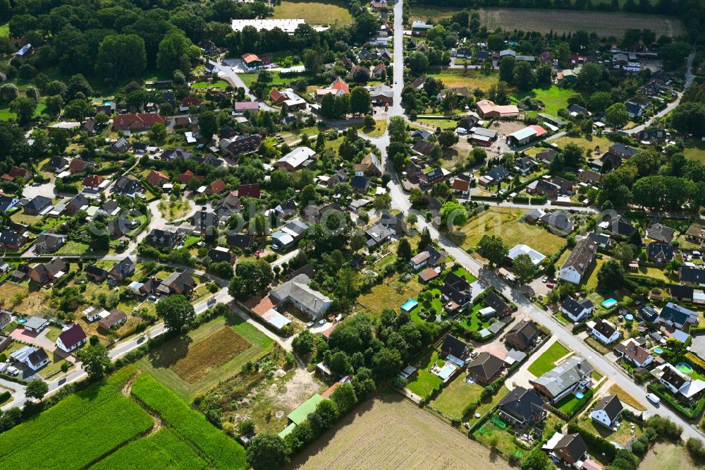 Negernbötel from the bird's eye view: Village - View along the street Lehwisch in Negernboetel in the state Schleswig-Holstein, Germany