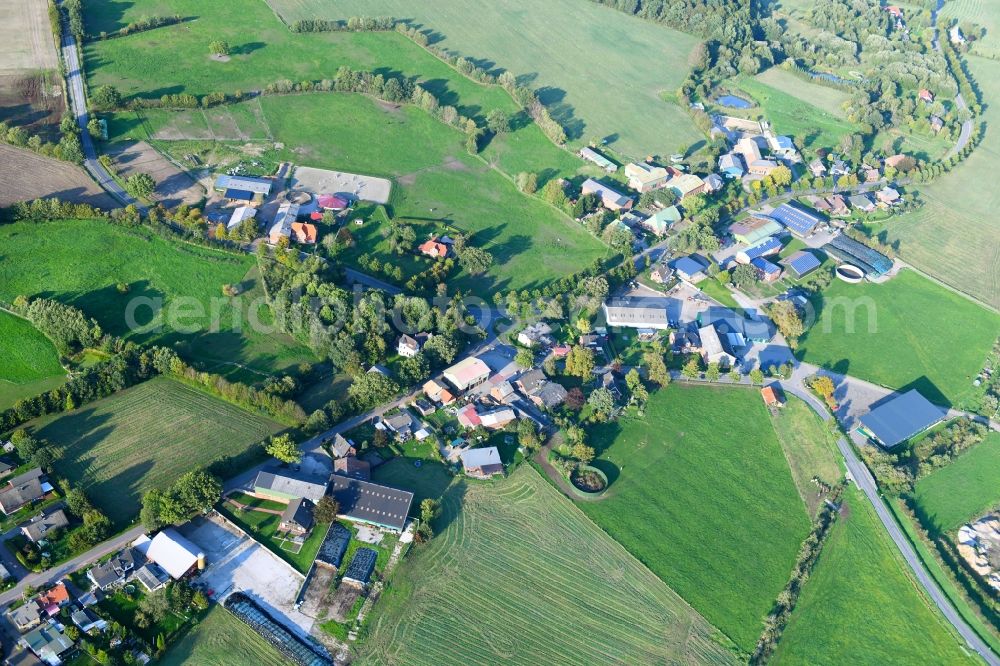 Oldenhütten from the bird's eye view: Village view in Oldenhuetten in the state Schleswig-Holstein, Germany