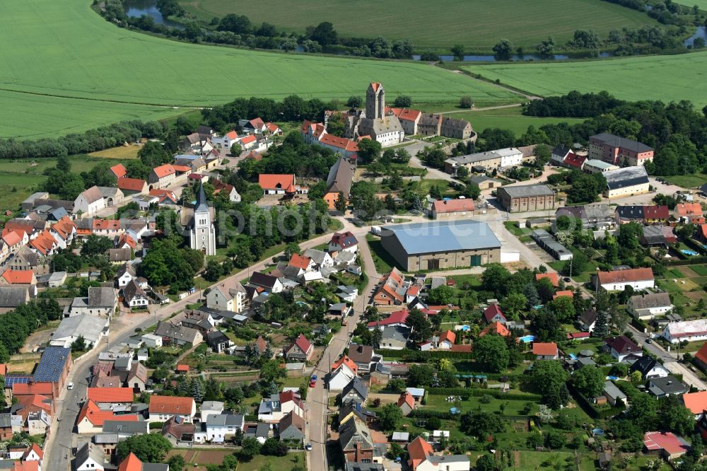 Plötzkau from the bird's eye view: Village view of Ploetzkau with the streets Schlossstrasse and Roehrstrang in the town center in the state Saxony-Anhalt