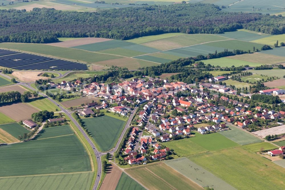 Alitzheim from above - Village - view on the edge of agricultural fields and farmland in Alitzheim in the state Bavaria, Germany