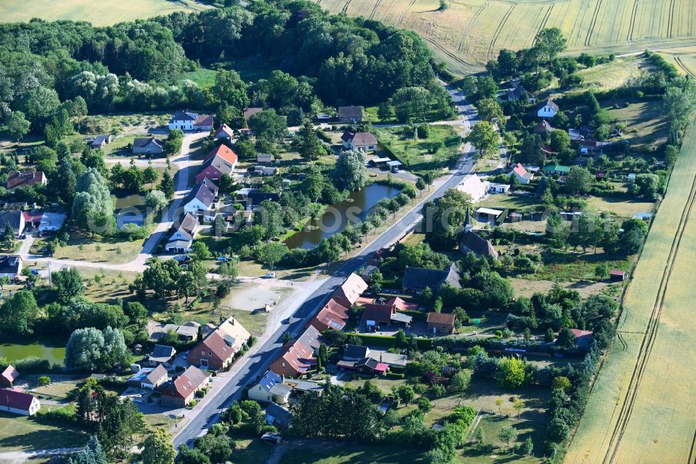 Alt Käbelich from the bird's eye view: Village - view on the edge of agricultural fields and farmland in Alt Kaebelich in the state Mecklenburg - Western Pomerania, Germany