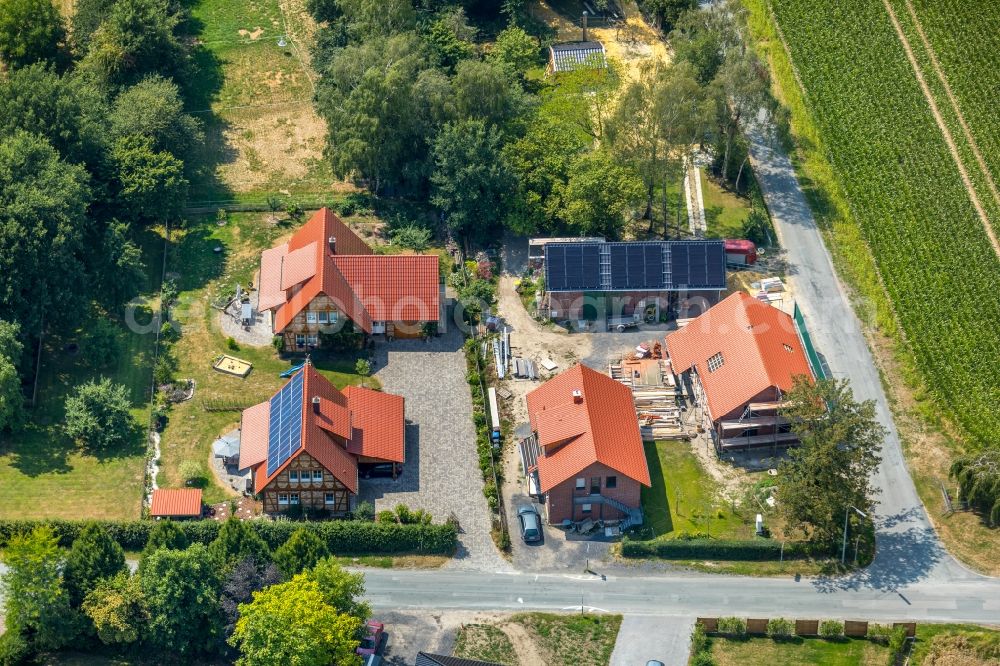 Ameke from the bird's eye view: Village - view on the edge of agricultural fields and farmland in Ameke in the state North Rhine-Westphalia, Germany