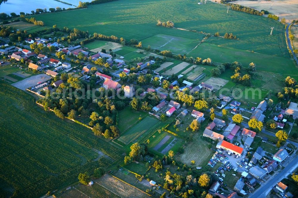 Aerial photograph Badingen - Village - view on the edge of agricultural fields and farmland in Badingen in the state Brandenburg, Germany