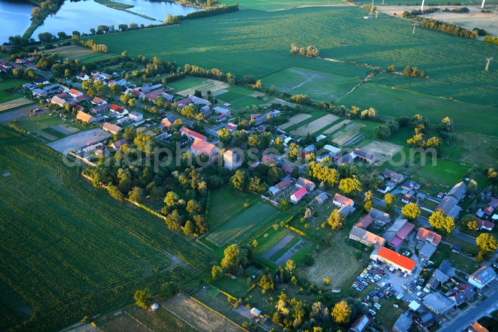 Badingen from above - Village - view on the edge of agricultural fields and farmland in Badingen in the state Brandenburg, Germany