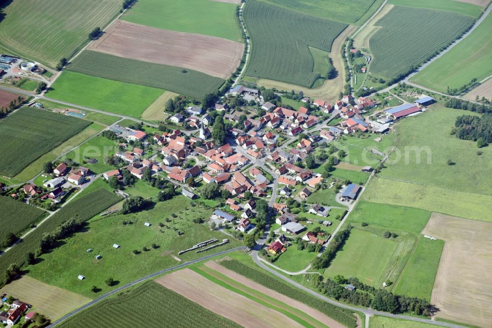 Bischwind a.Raueneck from the bird's eye view: Village - view on the edge of agricultural fields and farmland in Bischwind a.Raueneck in the state Bavaria, Germany