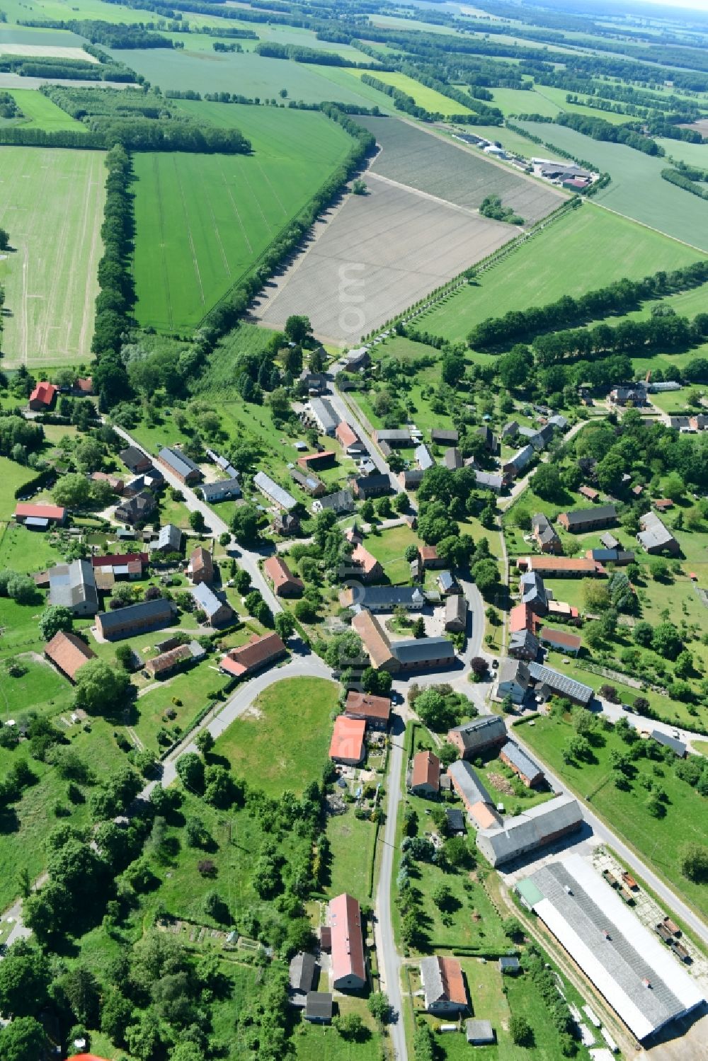 Aerial image Brunow - Village - view on the edge of agricultural fields and farmland in Brunow in the state Mecklenburg - Western Pomerania, Germany