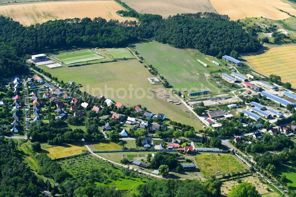 Criewen from the bird's eye view: Village - view on the edge of agricultural fields and farmland in Criewen in the state Brandenburg, Germany