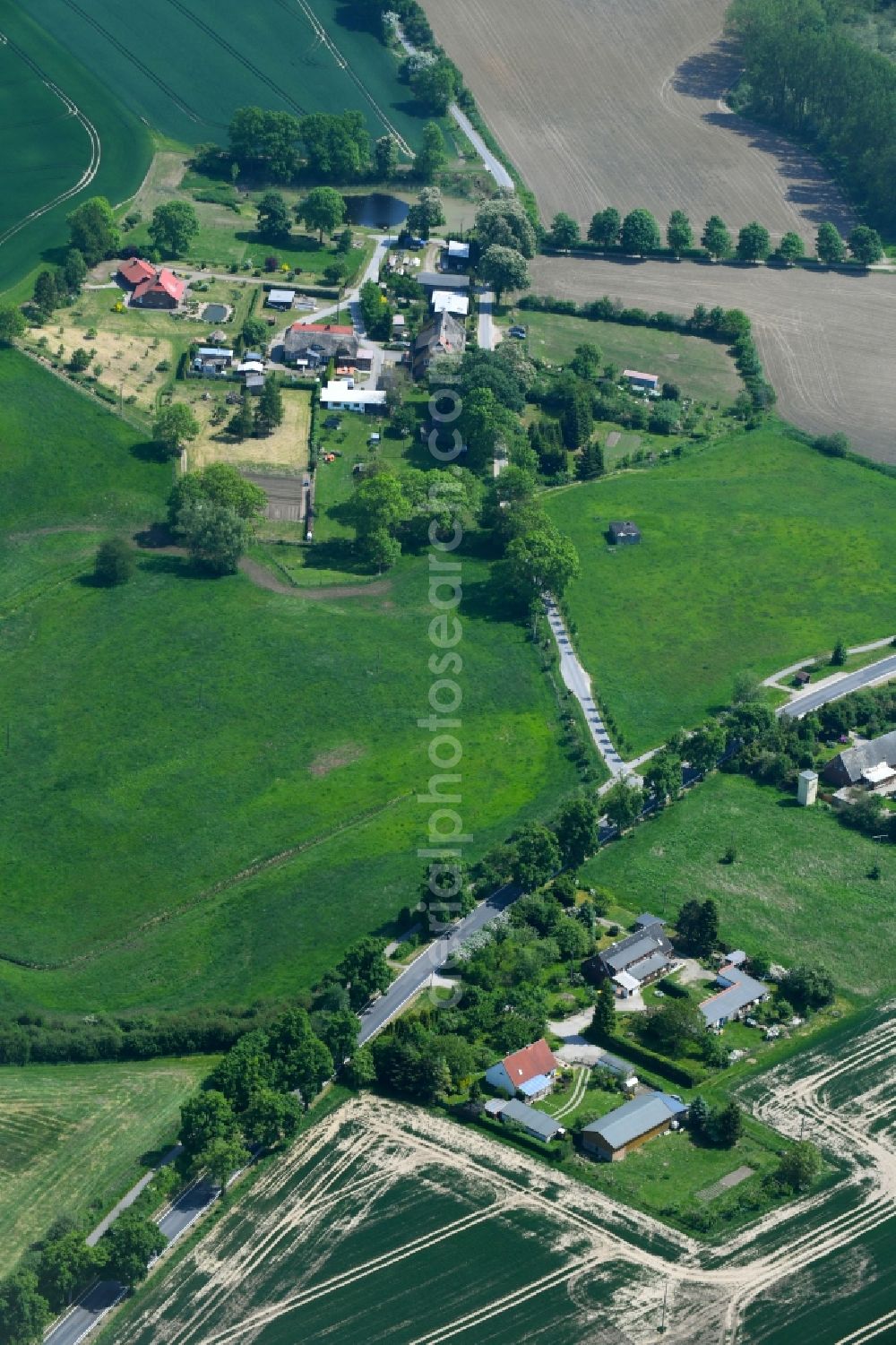 Aerial image Dalberg-Wendelstorf - Village - view on the edge of agricultural fields and farmland in Dalberg-Wendelstorf in the state Mecklenburg - Western Pomerania, Germany