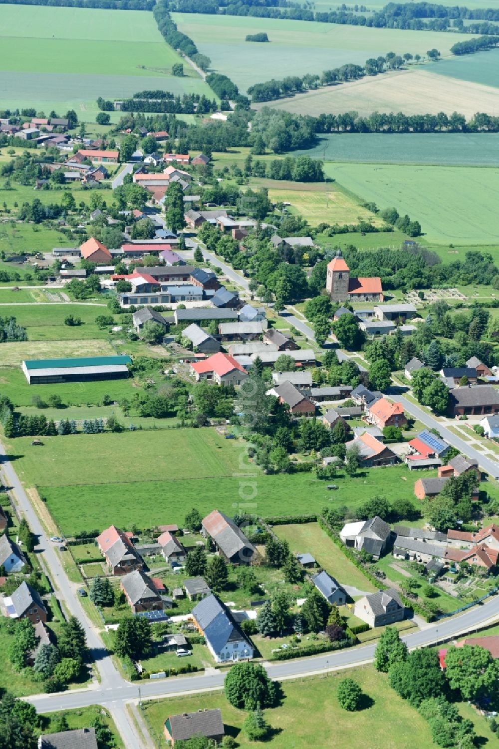 Aerial image Dambeck - Village - view on the edge of agricultural fields and farmland in Dambeck in the state Mecklenburg - Western Pomerania, Germany