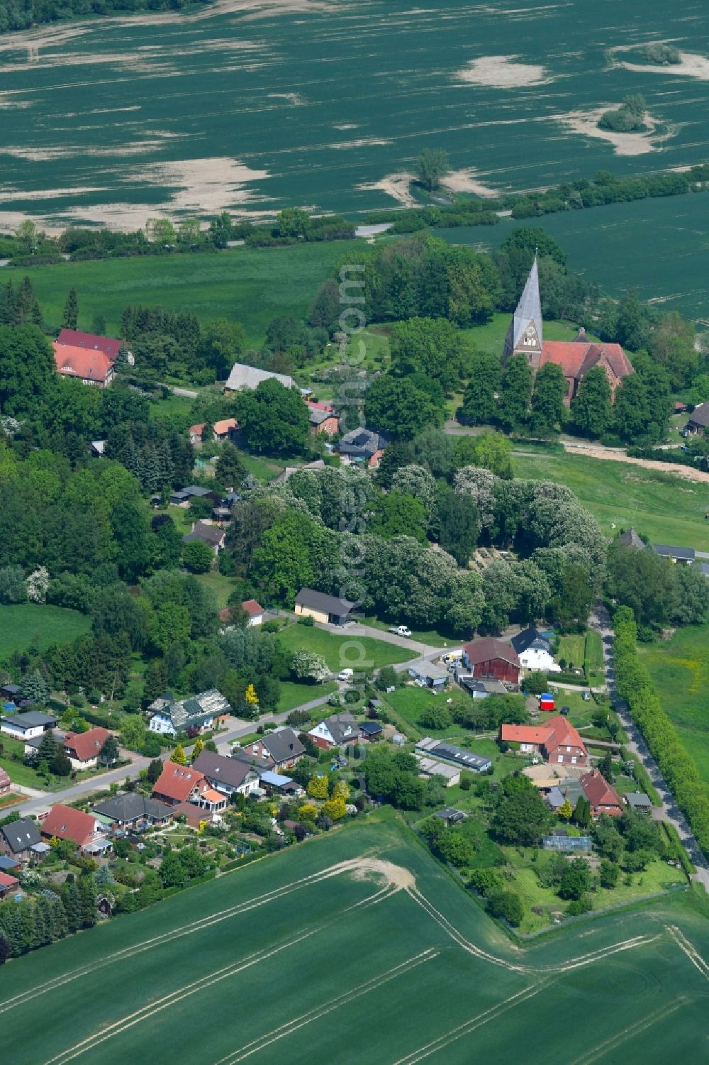 Diedrichshagen from above - Village - view on the edge of agricultural fields and farmland in Diedrichshagen in the state Mecklenburg - Western Pomerania, Germany