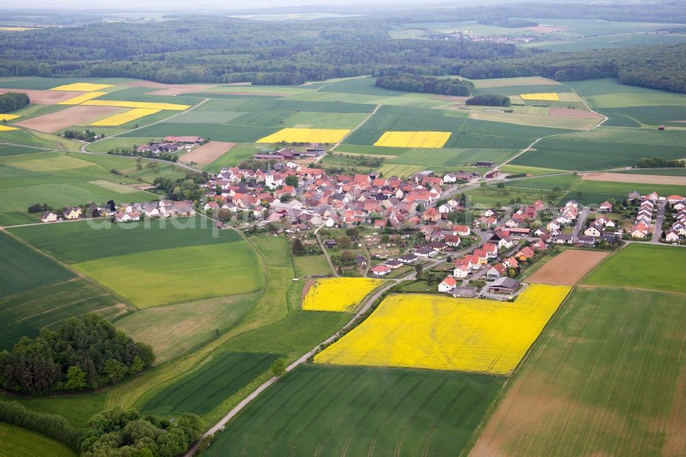 Ebertshausen from the bird's eye view: Village - view on the edge of agricultural fields and farmland in Ebertshausen in the state Bavaria