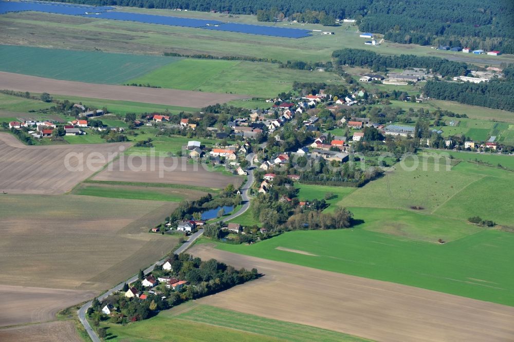 Eggersdorf from the bird's eye view: Village - view on the edge of agricultural fields and farmland in Eggersdorf in the state Brandenburg, Germany