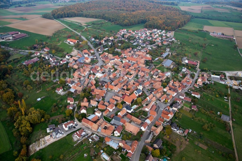 Aerial image Engwiller - Village - view on the edge of agricultural fields and farmland in Engwiller in Grand Est, France