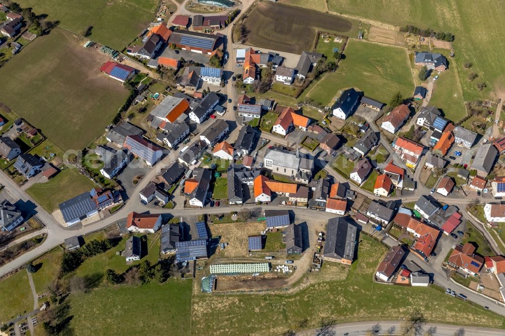 Eppe from the bird's eye view: Village - view on the edge of agricultural fields and farmland in Eppe in the state Hesse, Germany