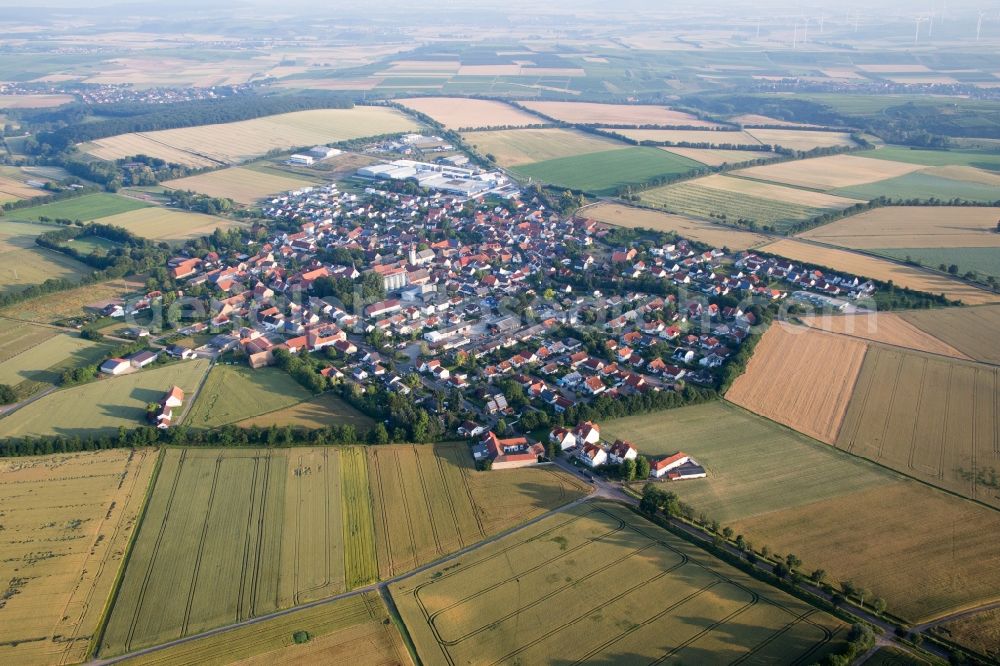 Aerial image Erbes-Büdesheim - Village - view on the edge of agricultural fields and farmland in Erbes-Buedesheim in the state Rhineland-Palatinate