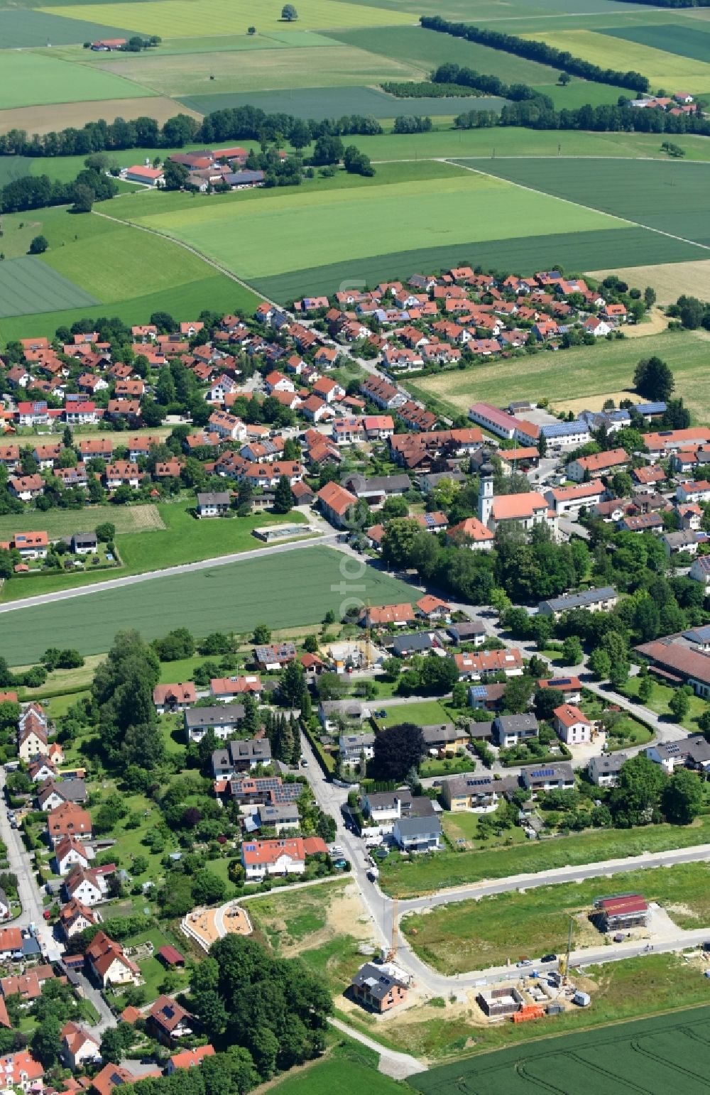 Finsing from above - Village - view on the edge of agricultural fields and farmland in Finsing in the state Bavaria, Germany