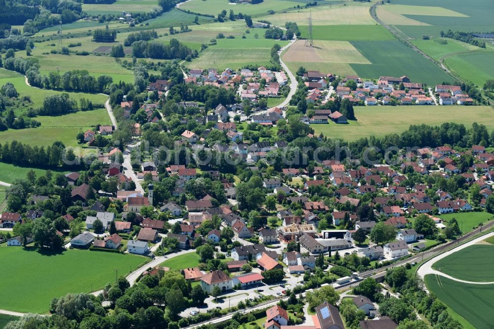 Finsing from the bird's eye view: Village - view on the edge of agricultural fields and farmland in Finsing in the state Bavaria, Germany