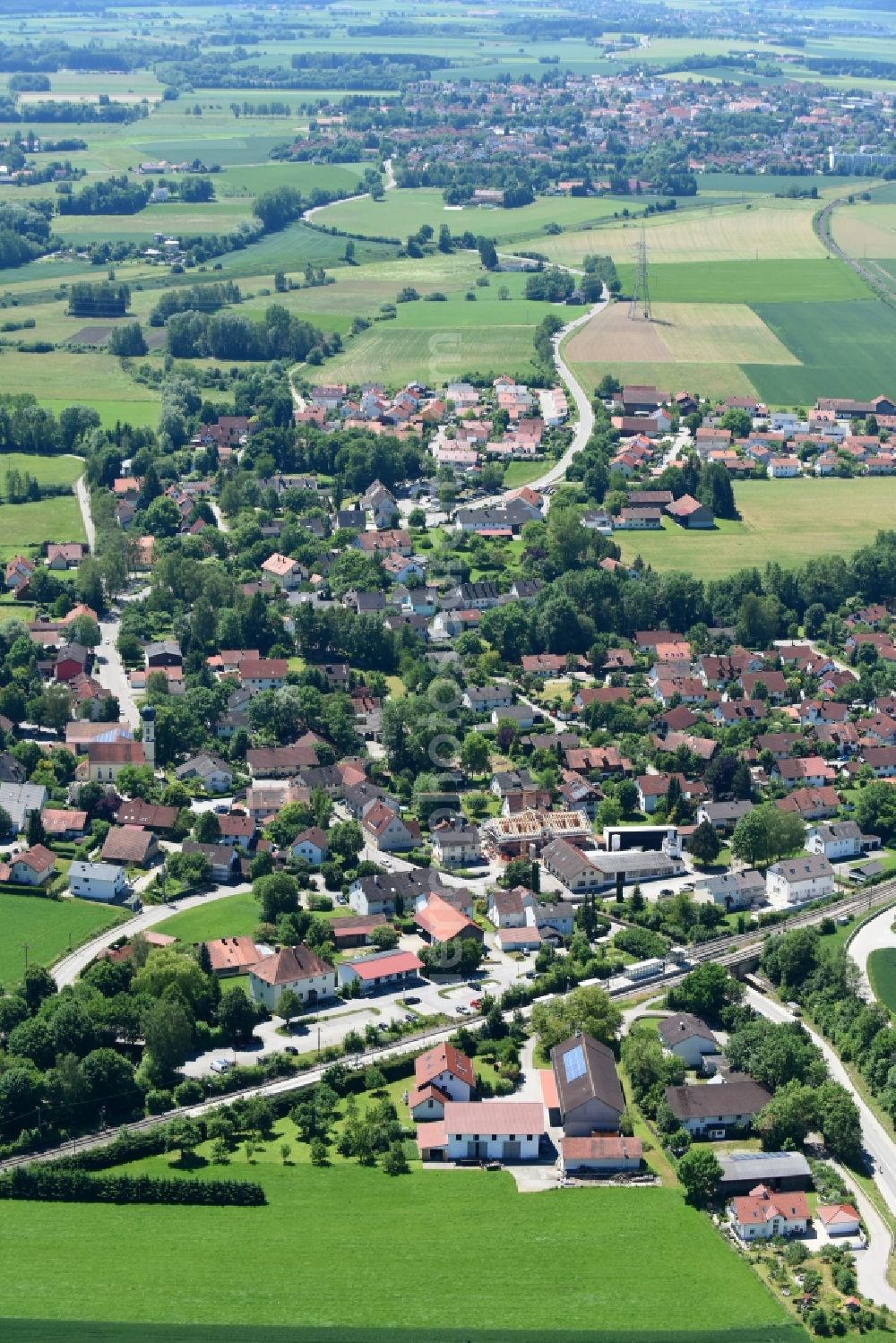 Aerial image Finsing - Village - view on the edge of agricultural fields and farmland in Finsing in the state Bavaria, Germany