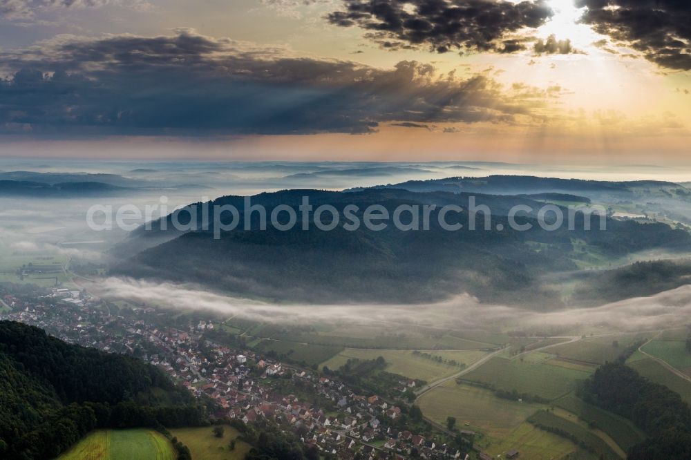 Radolfzell am Bodensee from above - The Lake of Constance hidden by morning fog over Village - view on the edge of agricultural fields and farmland in the district Stahringen in Radolfzell am Bodensee in the state Baden-Wuerttemberg, Germany