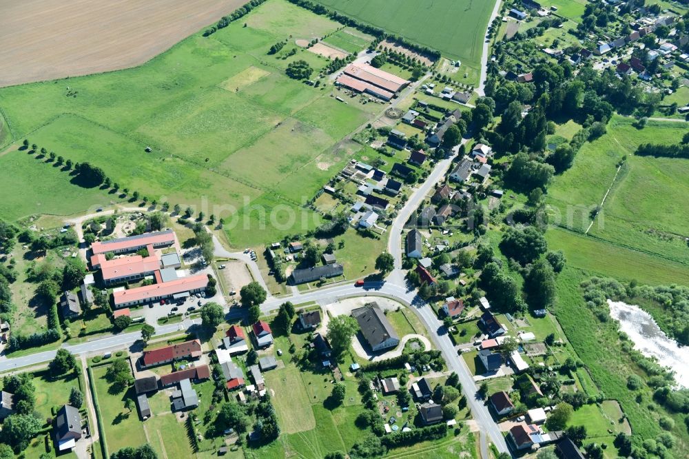 Friedrichsruhe from the bird's eye view: Village - view on the edge of agricultural fields and farmland in Friedrichsruhe in the state Mecklenburg - Western Pomerania, Germany