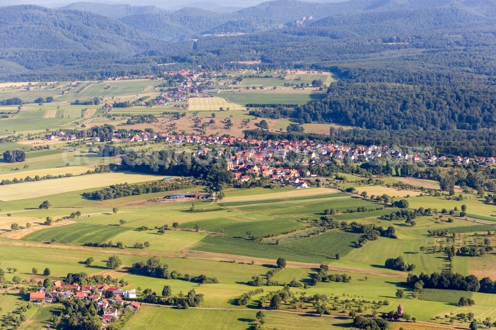 Frœschwiller from above - Village - view on the edge of agricultural fields and farmland in FrA?schwiller in Grand Est, France