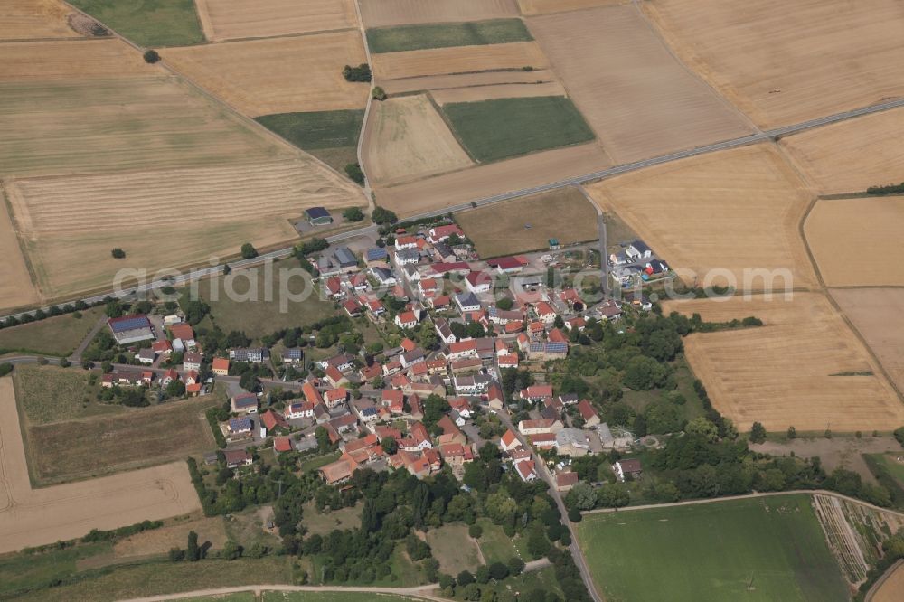 Gauersheim from the bird's eye view: Village - view on the edge of agricultural fields and farmland in Gauersheim in the state Rhineland-Palatinate, Germany