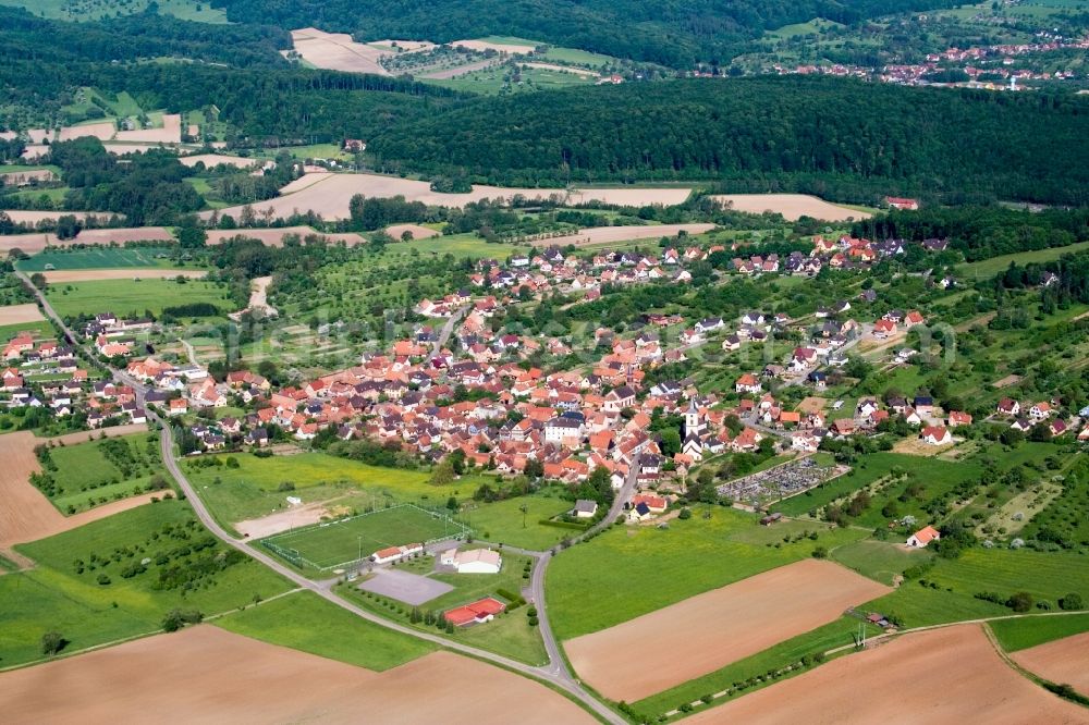 Gœrsdorf from the bird's eye view: Village - view on the edge of agricultural fields and farmland in GA?rsdorf in Grand Est, France