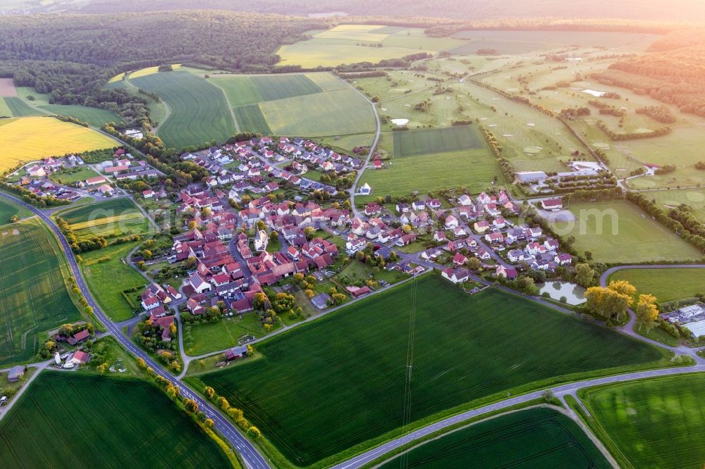 Aerial image Schonungen - Village - view on the edge of agricultural fields and farmland in the district Loeffelsterz in Schonungen in the state Bavaria, Germany