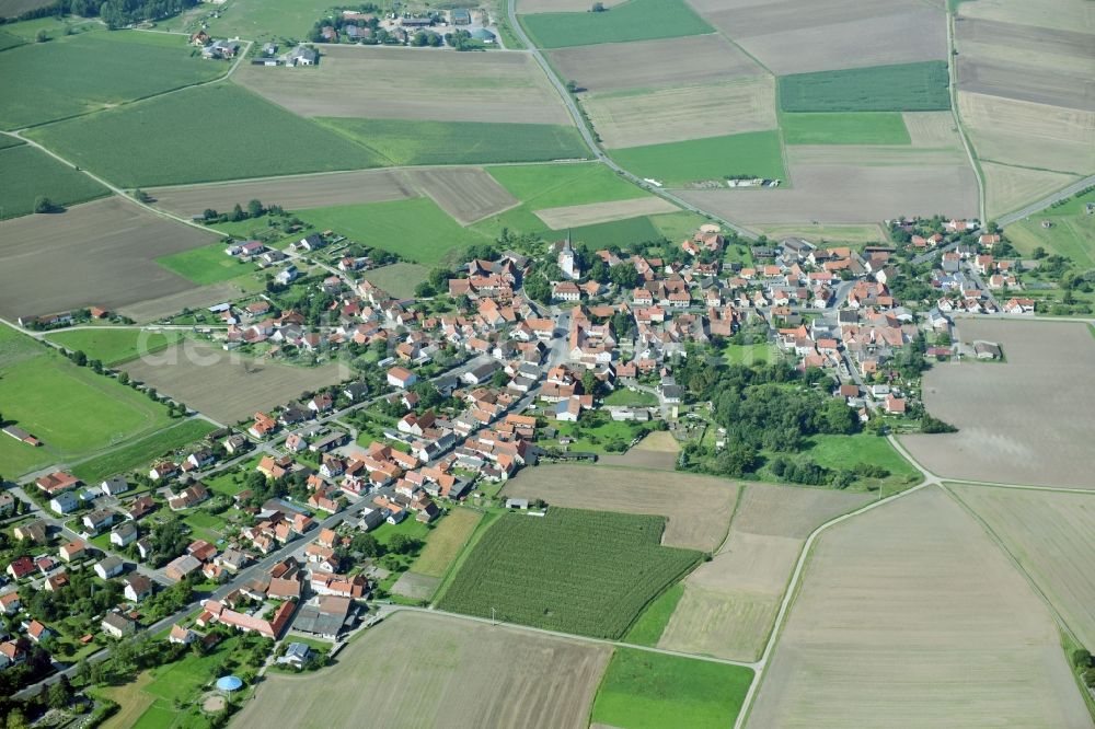 Aerial photograph Goßmannsdorf - Village - view on the edge of agricultural fields and farmland in Gossmannsdorf in the state Bavaria, Germany