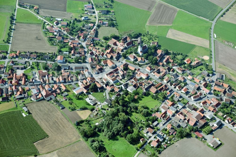 Aerial photograph Goßmannsdorf - Village - view on the edge of agricultural fields and farmland in Gossmannsdorf in the state Bavaria, Germany