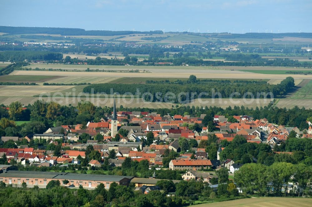 Gröningen from the bird's eye view: Village - view on the edge of agricultural fields and farmland in Groeningen in the state Saxony-Anhalt, Germany