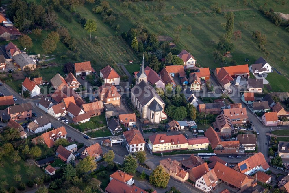 Aerial image Gunstett - Village - view on the edge of agricultural fields and farmland in Gunstett in Grand Est, France