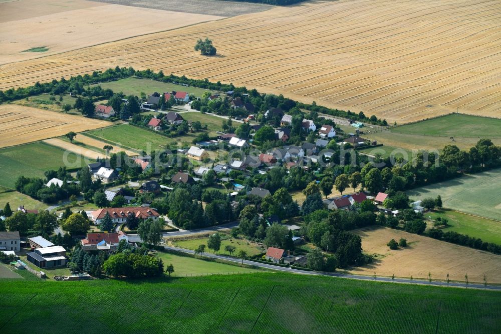 Aerial image Heckelberg-Brunow - Village - view on the edge of agricultural fields and farmland in Heckelberg-Brunow in the state Brandenburg, Germany