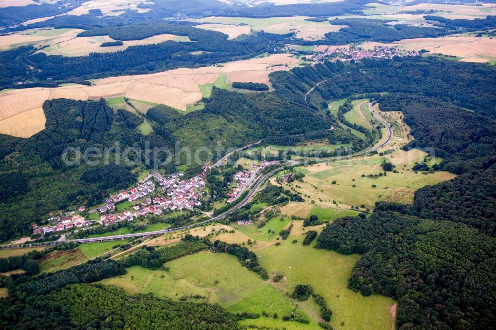 Aerial image Heinzenhausen - Village - view on the edge of agricultural fields and farmland in Heinzenhausen in the state Rhineland-Palatinate, Germany