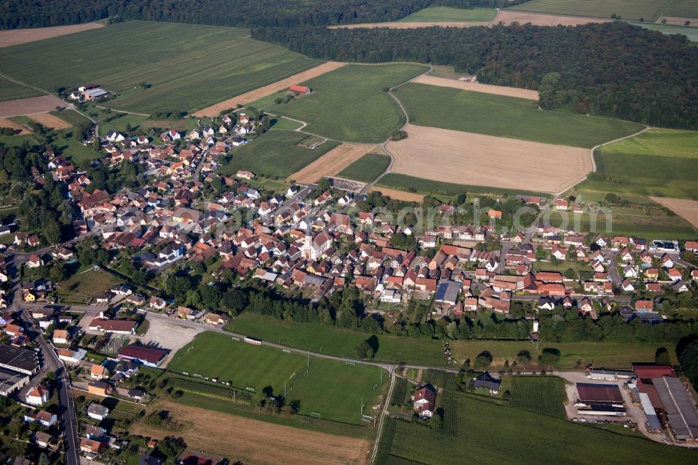 Herbsheim from the bird's eye view: Village - view on the edge of agricultural fields and farmland in Herbsheim in Grand Est, France