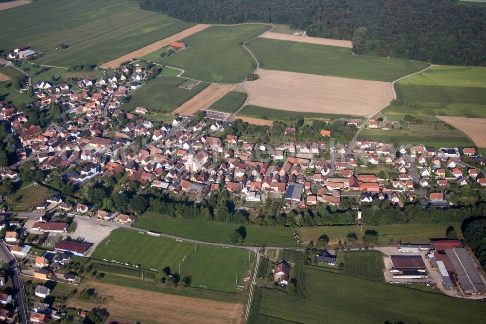 Aerial image Herbsheim - Village - view on the edge of agricultural fields and farmland in Herbsheim in Grand Est, France