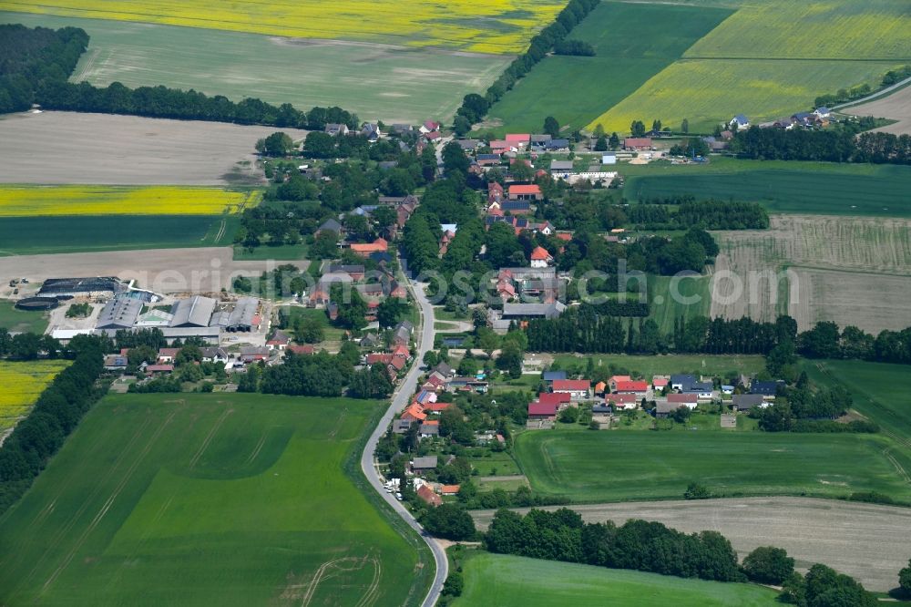 Herzfeld from above - Village - view on the edge of agricultural fields and farmland in Herzfeld in the state Mecklenburg - Western Pomerania, Germany