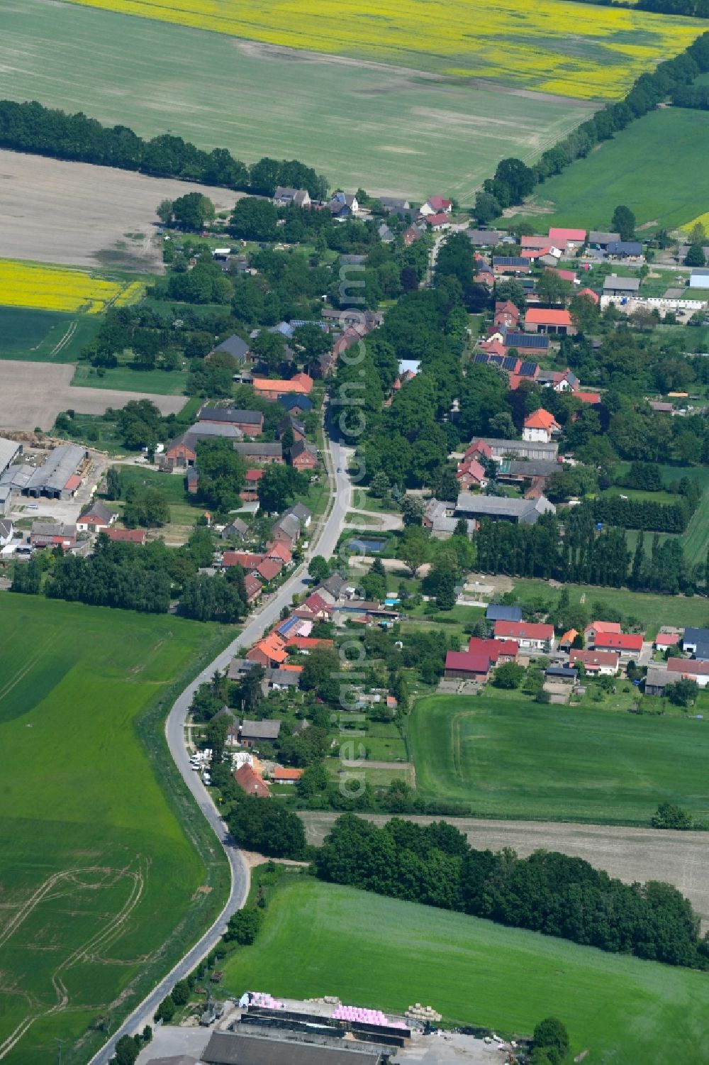 Aerial photograph Herzfeld - Village - view on the edge of agricultural fields and farmland in Herzfeld in the state Mecklenburg - Western Pomerania, Germany