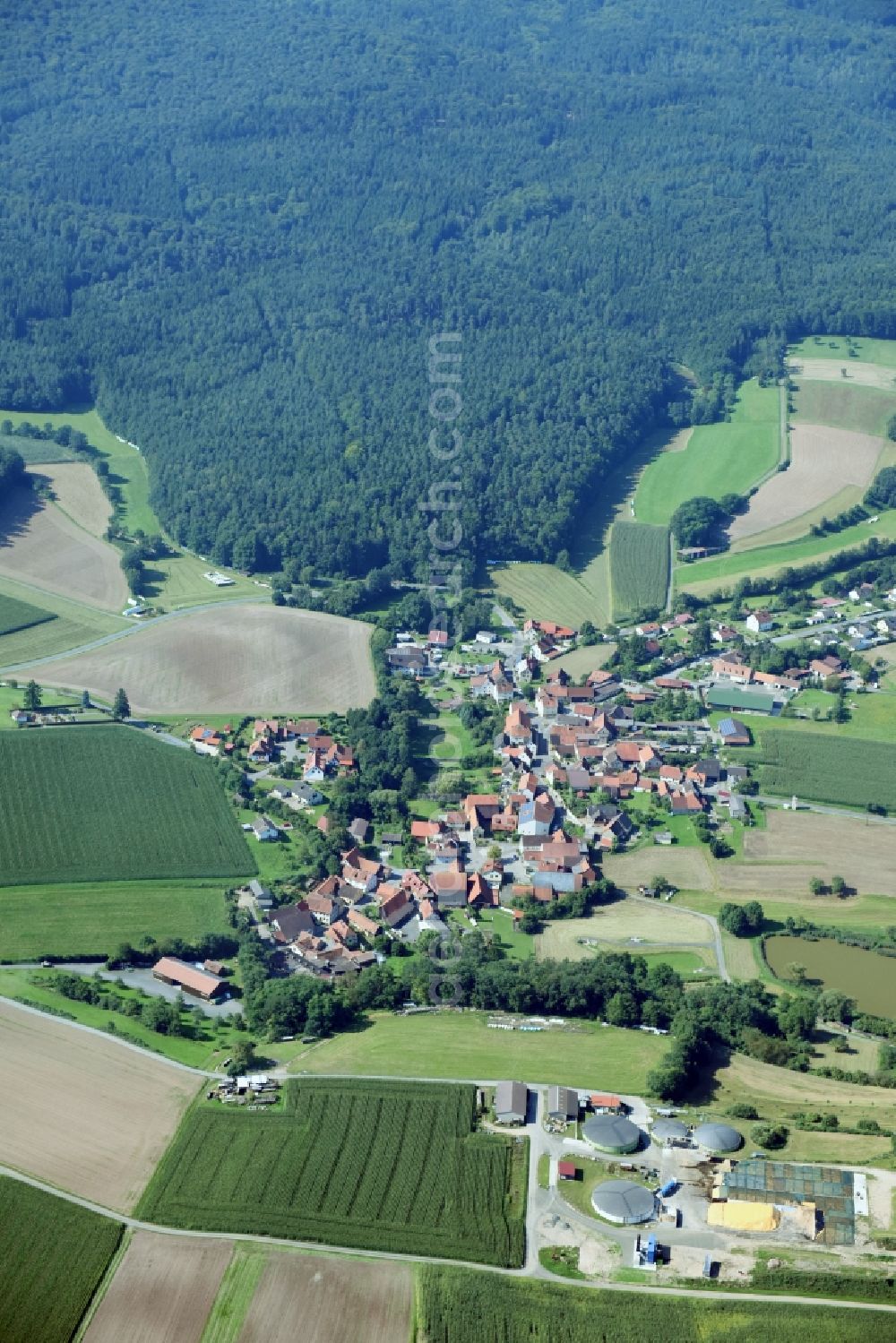 Hohnhausen from above - Village - view on the edge of agricultural fields and farmland in Hohnhausen in the state Bavaria, Germany