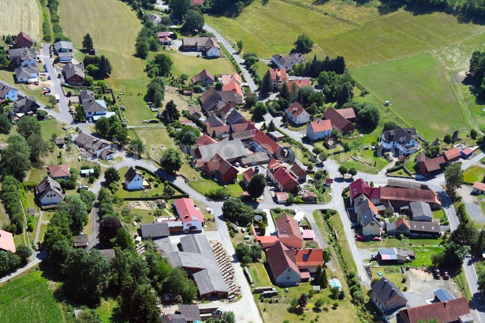 Hollstein from above - Village - view on the edge of agricultural fields and farmland in Hollstein in the state Hesse, Germany