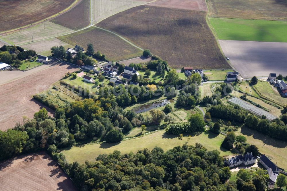 Aerial image Huismes - Village - view on the edge of agricultural fields and farmland in Huismes in Centre-Val de Loire, France