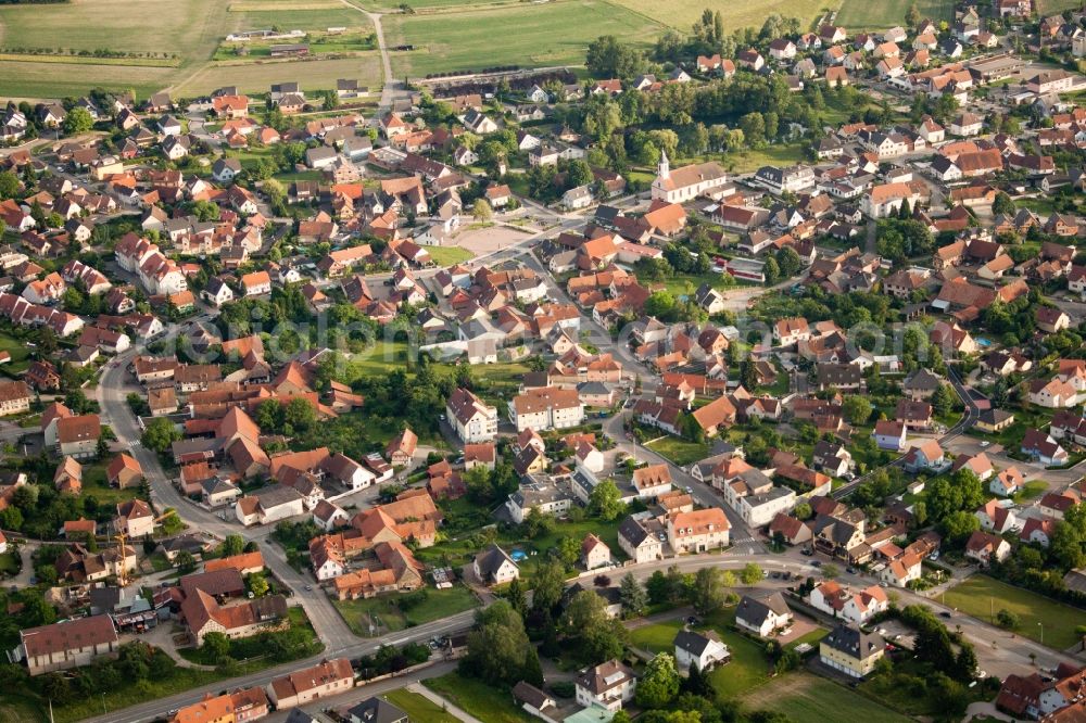 Kilstett from the bird's eye view: Village - view on the edge of agricultural fields and farmland in Kilstett in Grand Est, France