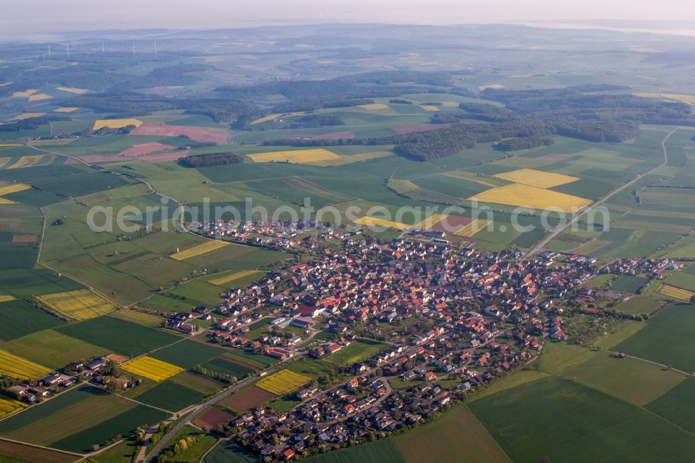 Kleinrinderfeld from above - Village - view on the edge of agricultural fields and farmland in Kleinrinderfeld in the state Bavaria, Germany