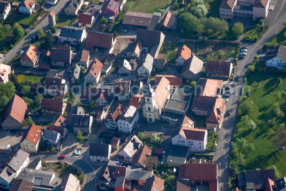 Aerial image Kleinrinderfeld - Village - view on the edge of agricultural fields and farmland in Kleinrinderfeld in the state Bavaria, Germany