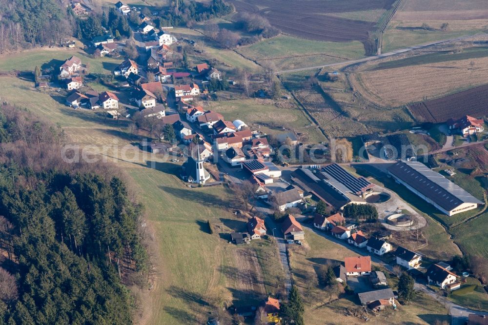 Kocherbach from the bird's eye view: Village - view on the edge of agricultural fields and farmland in Kocherbach in the state Hesse, Germany