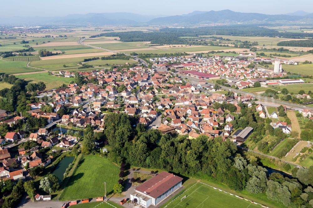 Kogenheim from above - Village - view on the edge of agricultural fields and farmland in Kogenheim in Grand Est, France