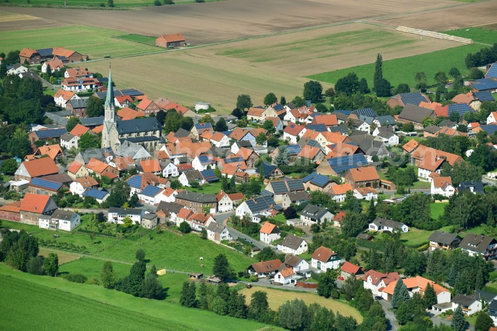 Körbecke from above - Village - view on the edge of agricultural fields and farmland in Koerbecke in the state North Rhine-Westphalia, Germany